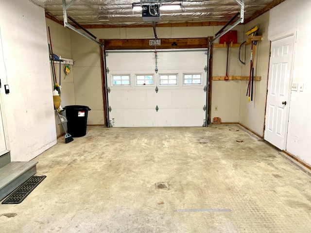 garage featuring a garage door opener