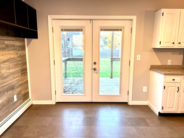 doorway featuring french doors and baseboard heating