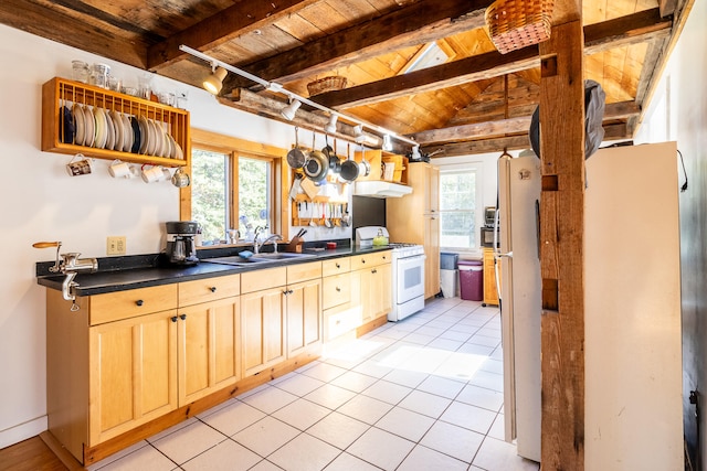 kitchen with wood ceiling, white gas range, sink, light tile patterned floors, and light brown cabinetry