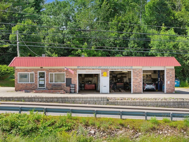 442-448 Maine Ave, Farmingdale, ME 04344 - view of building exterior featuring a garage
