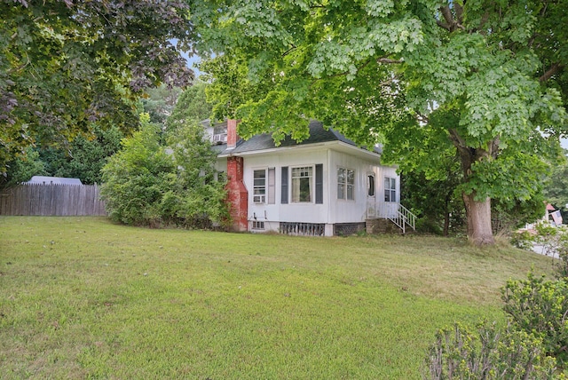 exterior space with a yard