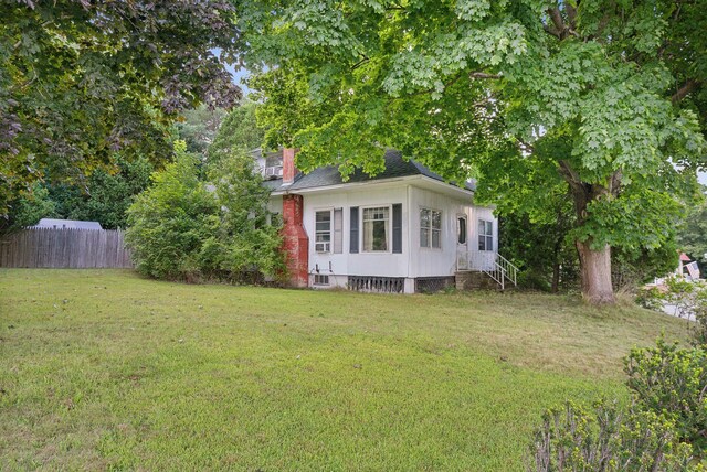 442-448 Maine Ave, Farmingdale, ME 04344 - view of front of house featuring roof with shingles and entry steps