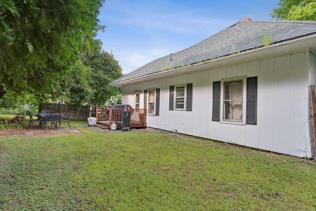 view of yard featuring a wooden deck