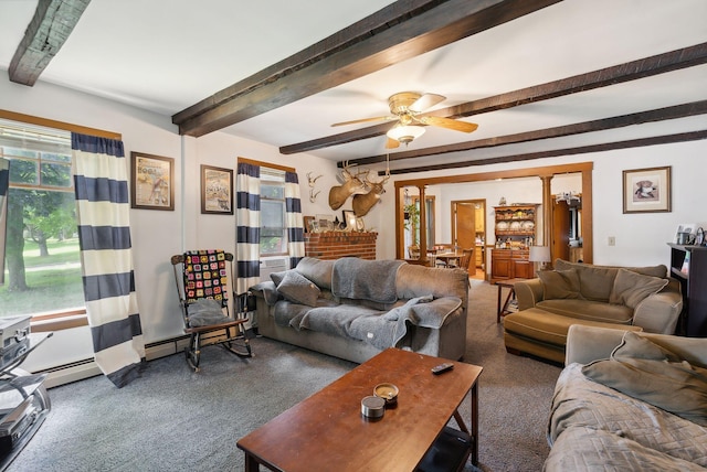 carpeted living room with ceiling fan and beamed ceiling