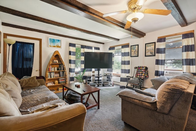 living room featuring beamed ceiling, carpet, a healthy amount of sunlight, and ceiling fan