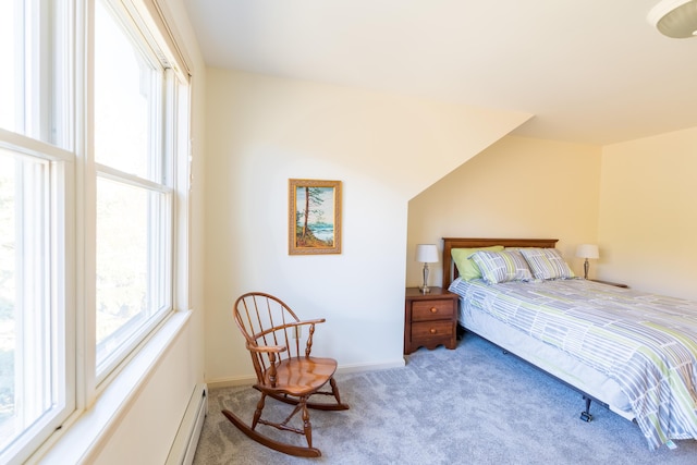 carpeted bedroom featuring baseboards, multiple windows, and baseboard heating