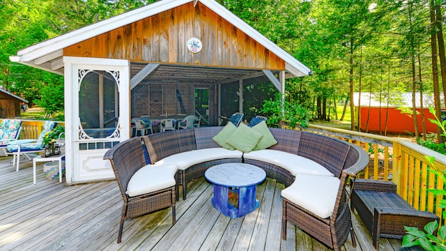 wooden deck featuring an outdoor living space