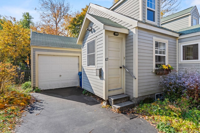 exterior space with a garage