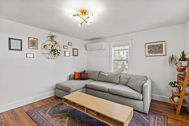 living room with hardwood / wood-style flooring and a wall mounted AC