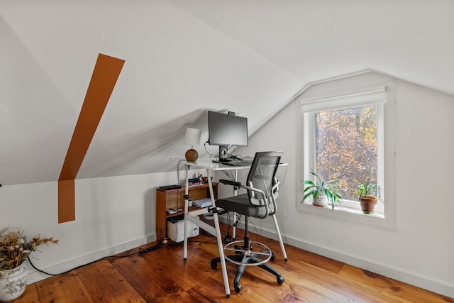 office space with lofted ceiling and hardwood / wood-style floors