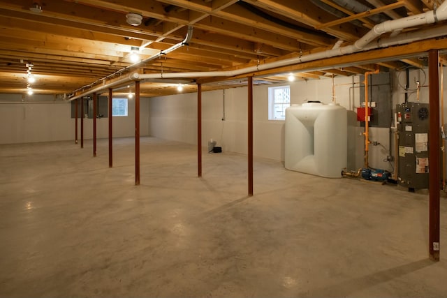 basement featuring water heater