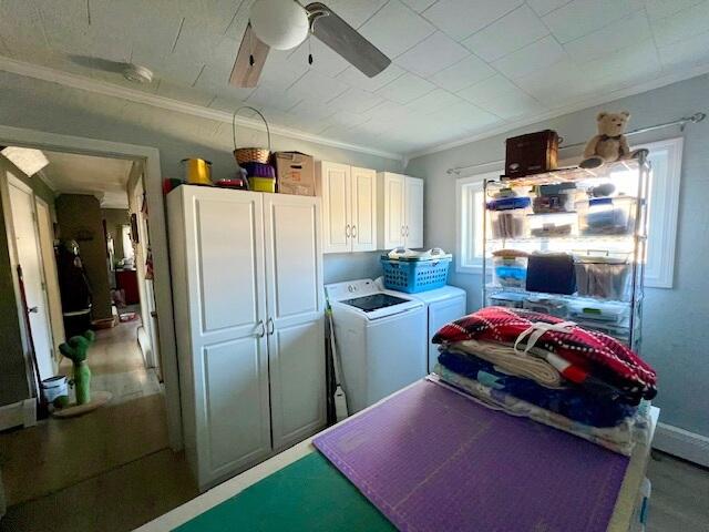 laundry room with ornamental molding, ceiling fan, and separate washer and dryer