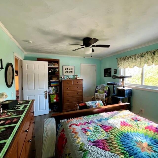 bedroom with ornamental molding and ceiling fan