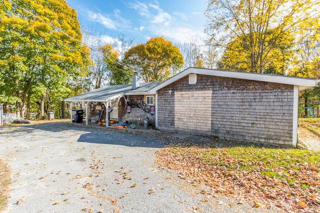 exterior space featuring a carport