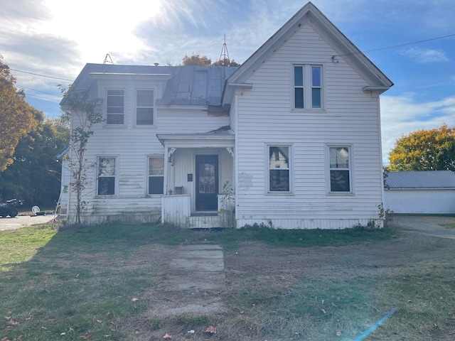 view of front of property with a front lawn