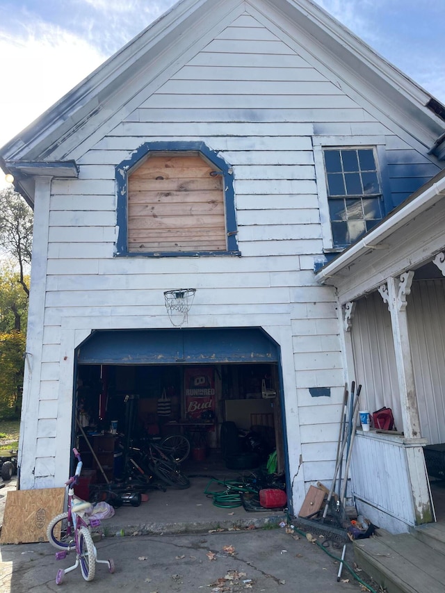 view of property exterior with a garage