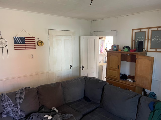 living room featuring washer / dryer