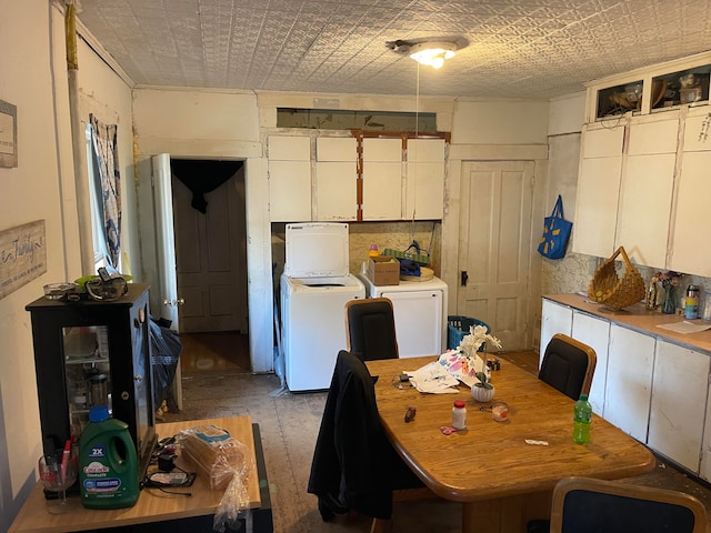 dining room with separate washer and dryer