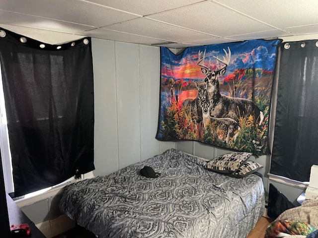 bedroom with a paneled ceiling