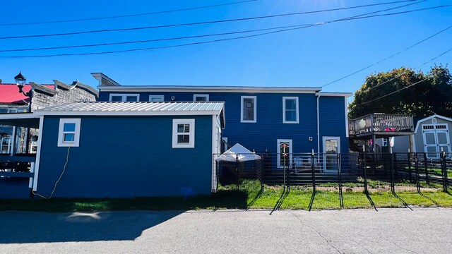 exterior space featuring a storage unit