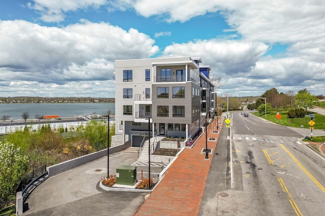 exterior space with a water view