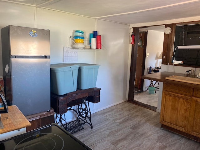 kitchen with stainless steel refrigerator