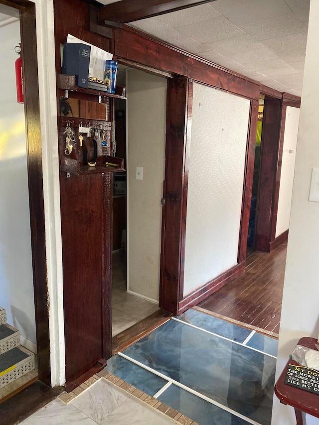 hall featuring dark hardwood / wood-style floors