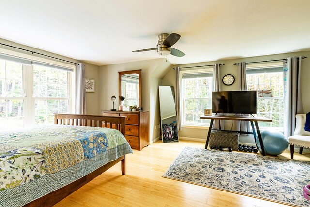 bedroom featuring light hardwood / wood-style floors and ceiling fan