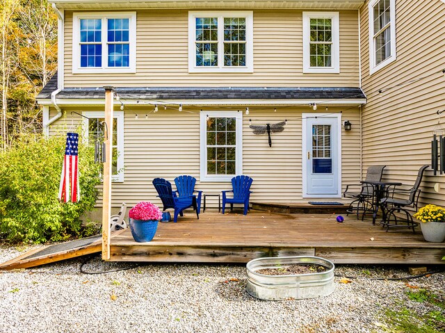 rear view of house with a deck