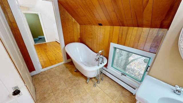 bathroom with wood ceiling, a bathtub, vaulted ceiling, wood walls, and baseboard heating