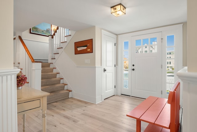 foyer with light hardwood / wood-style floors