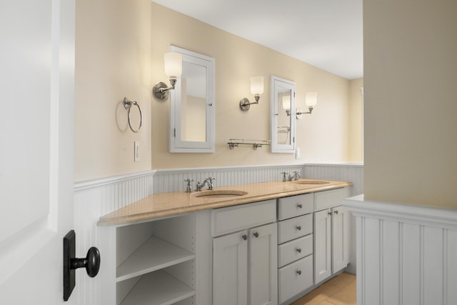 bathroom with vanity and tile patterned floors