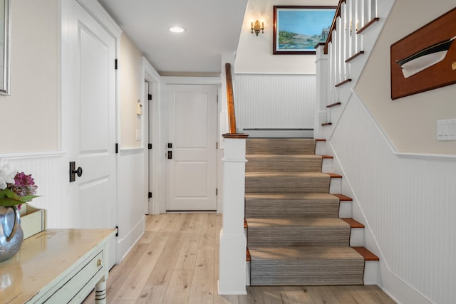 stairway featuring hardwood / wood-style flooring