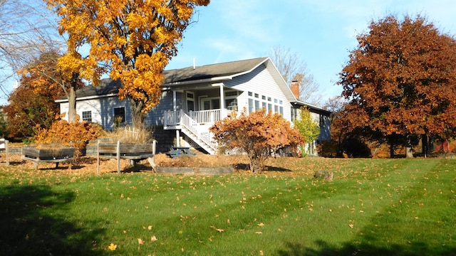 exterior space with a front lawn