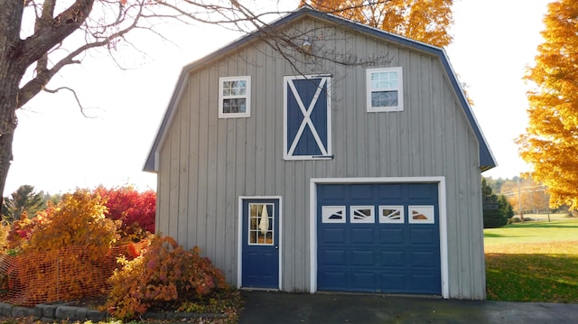 view of side of property with a garage