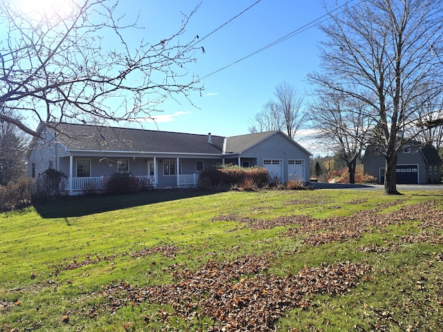 view of front facade featuring a front yard and a garage