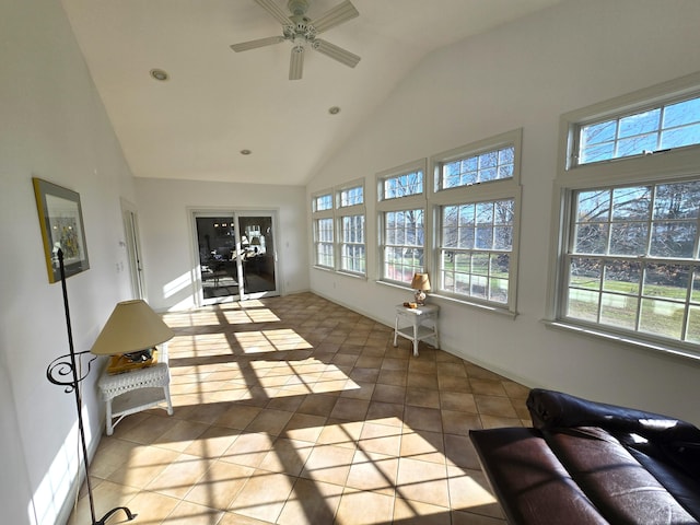 sunroom with lofted ceiling and ceiling fan