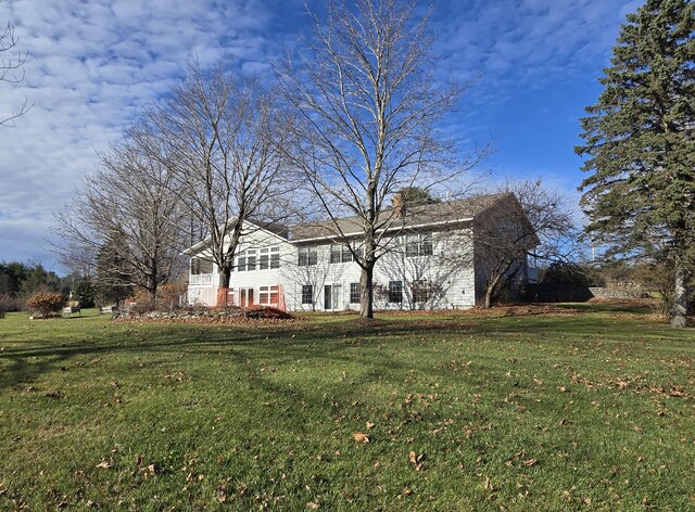 exterior space featuring a lawn