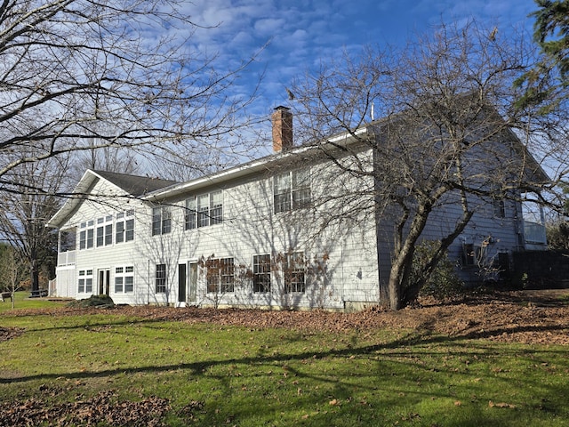 view of property exterior featuring a yard