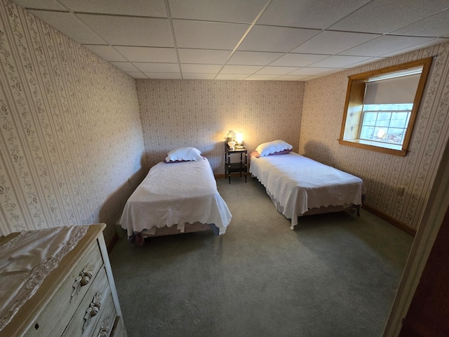 bedroom featuring a drop ceiling