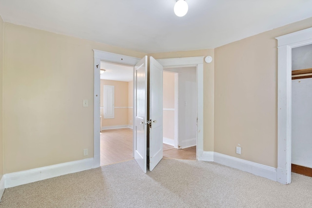19 Harding St, Biddeford, ME 04005 - unfurnished bedroom with carpet floors, a closet, and baseboards