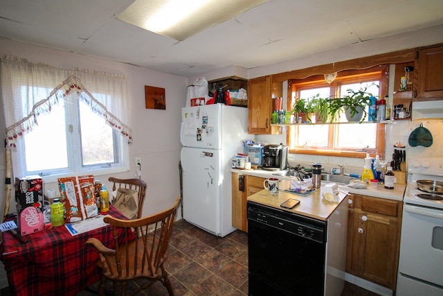 kitchen featuring extractor fan and white appliances