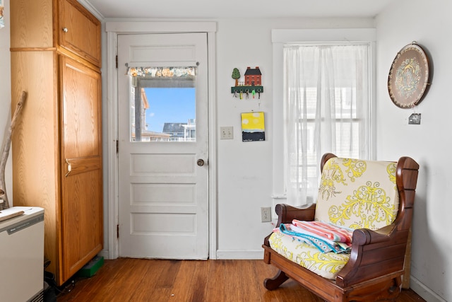 doorway to outside with hardwood / wood-style flooring