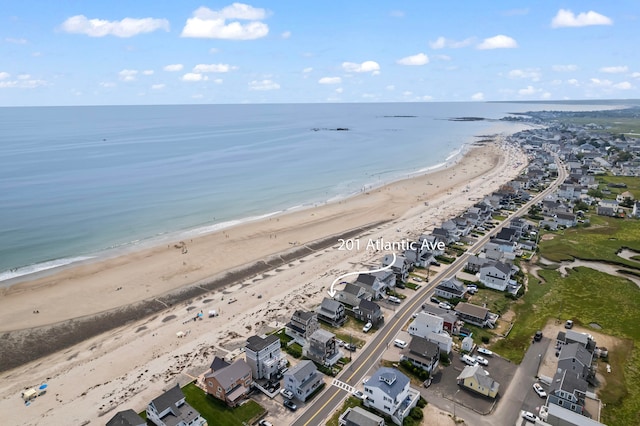 aerial view with a view of the beach and a water view