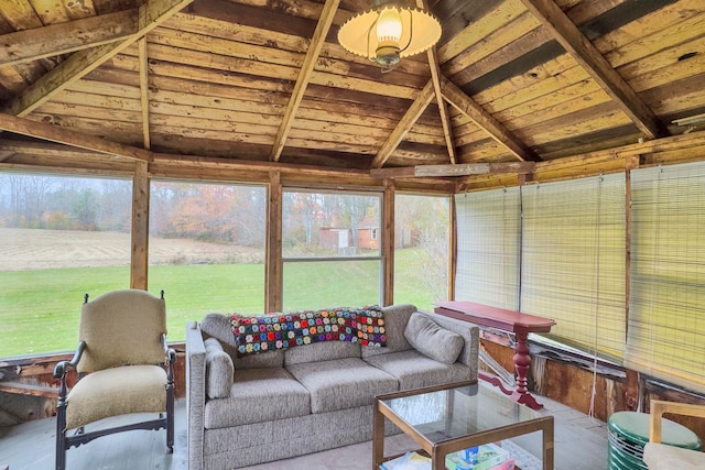 sunroom / solarium featuring lofted ceiling with beams, wooden ceiling, and plenty of natural light