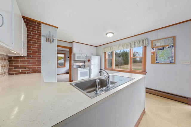 kitchen featuring white cabinetry, brick wall, sink, white appliances, and a baseboard heating unit