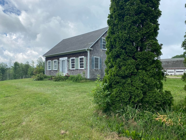 view of front of house with a front lawn