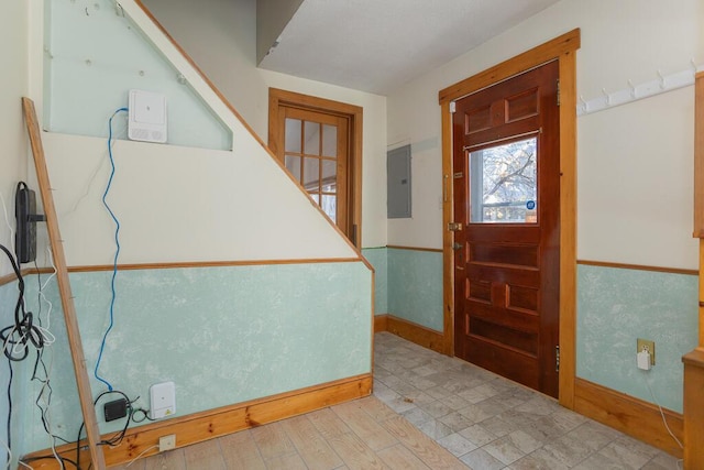 entrance foyer featuring electric panel and light hardwood / wood-style flooring