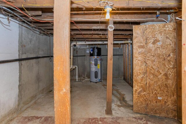 basement featuring hybrid water heater