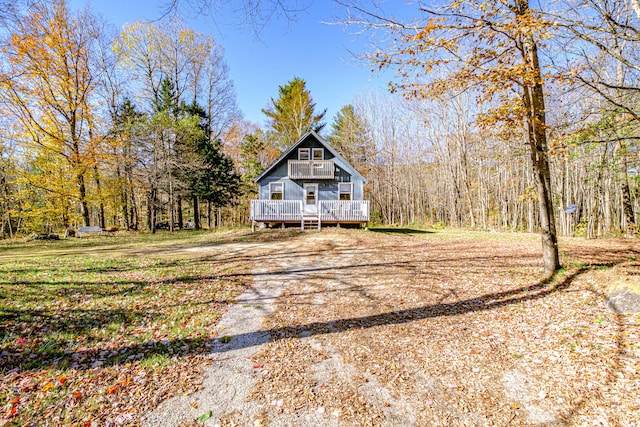 view of front facade featuring a wooden deck